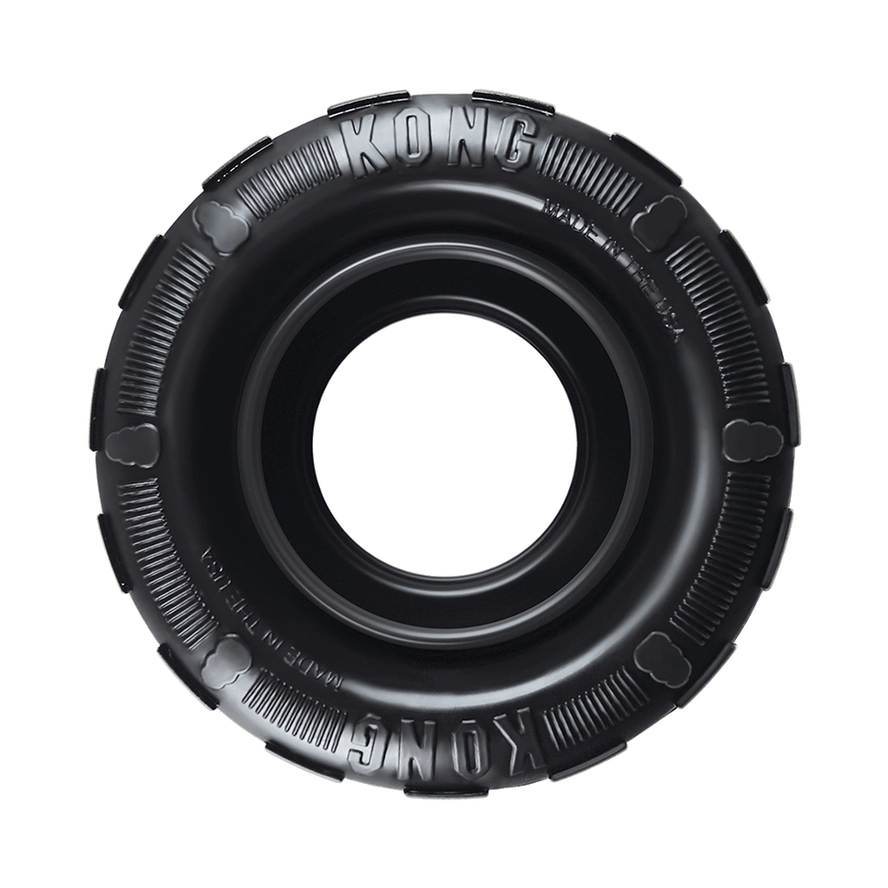 Jouet KONG Traxx noir en forme de pneu, conçu pour les jeux de mastication ou de récupération.