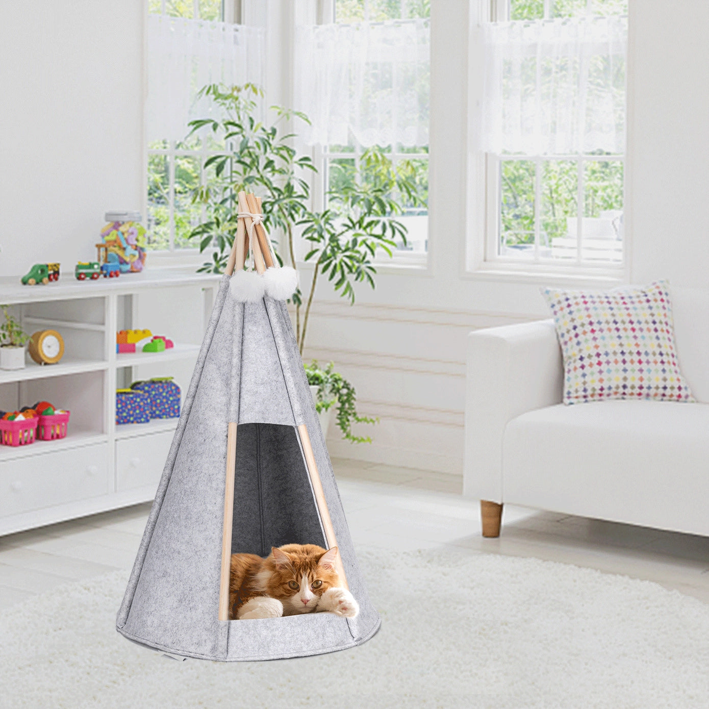 Tente tipi pour chat en tissu gris, dotée d'un design mignon avec patte et œil bleu, offrant un espace douillet et sécurisé pour que votre chat puisse se détendre.
